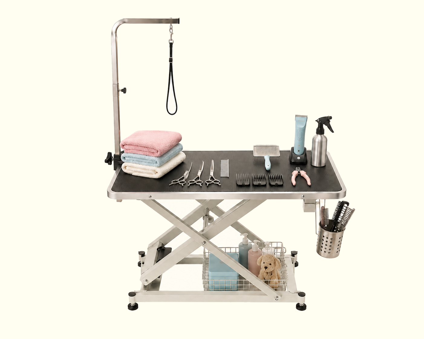 A Dawgs & Paws grooming table set with brushes, clippers, and towels